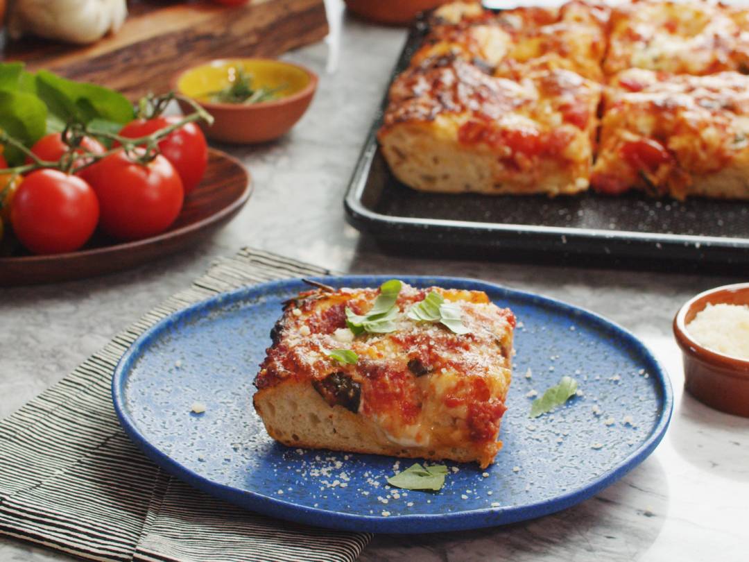 SHEET PAN FOCACCIA PIZZA WITH CRUSHED SAN MARZANOS & MOZZARELLA